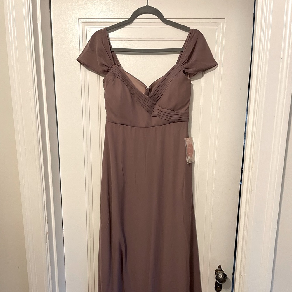 Never been worn Birdy Grey bridesmaid dress, size XS, versatile shoulder.